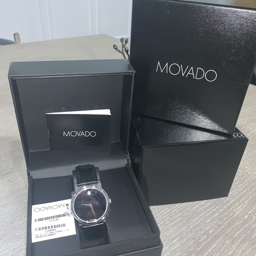 Movado watch. Swiss movement. Black leather band.